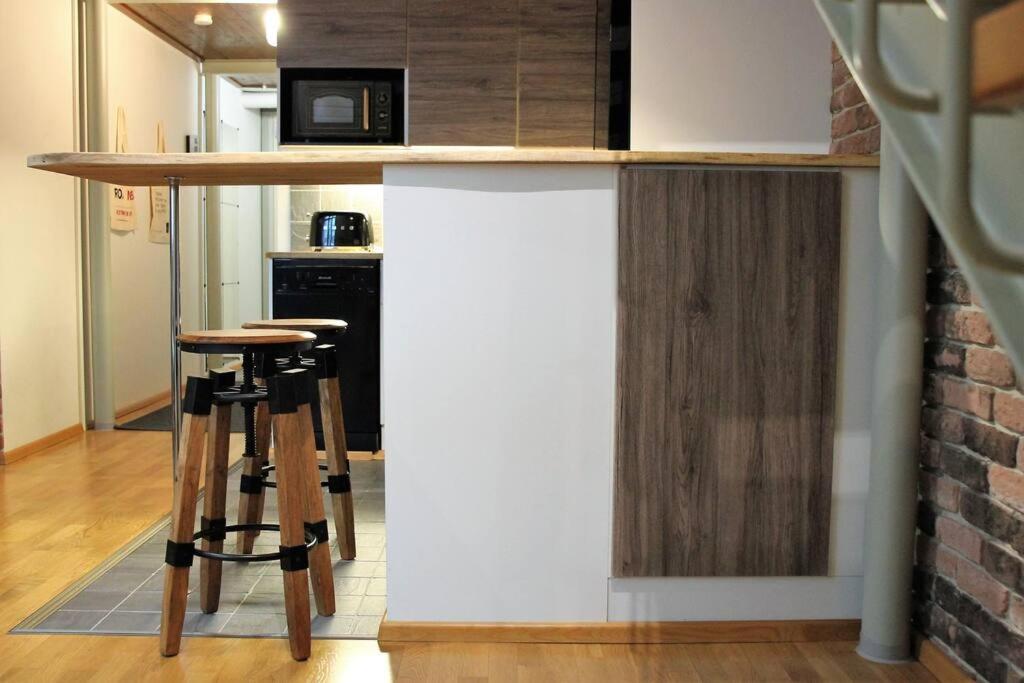 Huoneisto Riverside Loft With Sauna